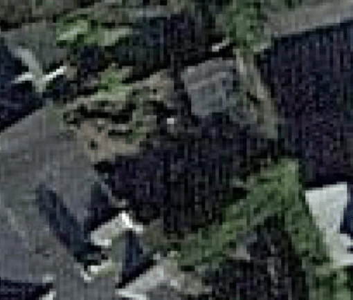 A screenshot from google maps showing a house and garden.